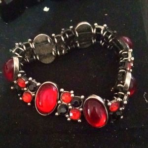 Bracelet with Coral and dark stones